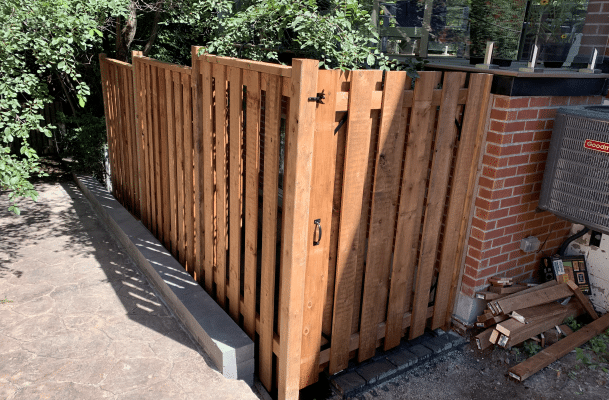 fencing wood at our client