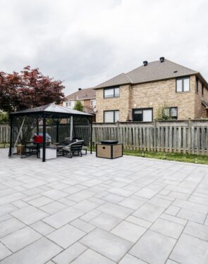 paved backyard with patio