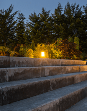 Landscape lighting on interlocking steps