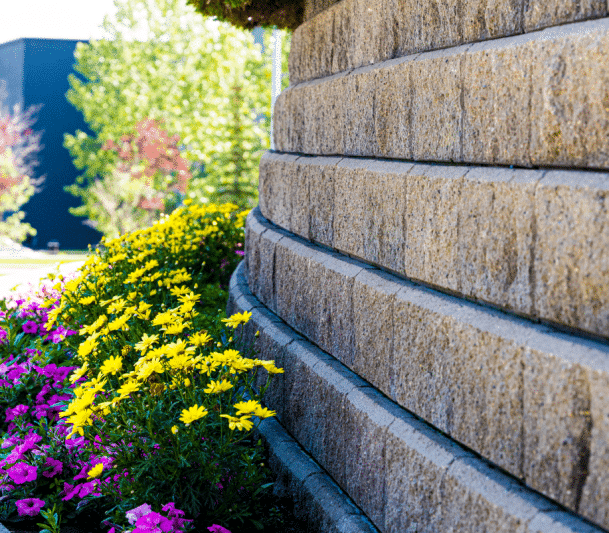 Block retaining wall with flowers
