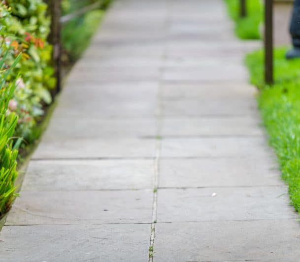 concrete walkway with several square slabs