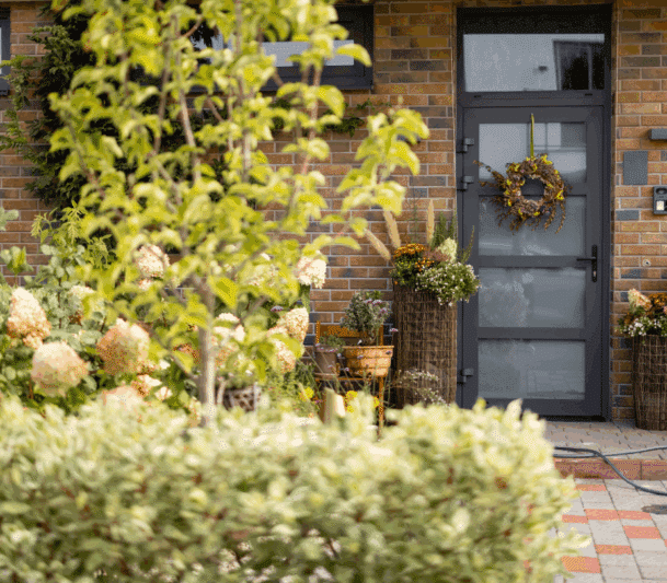 Interlocking front porch with beautiful plants