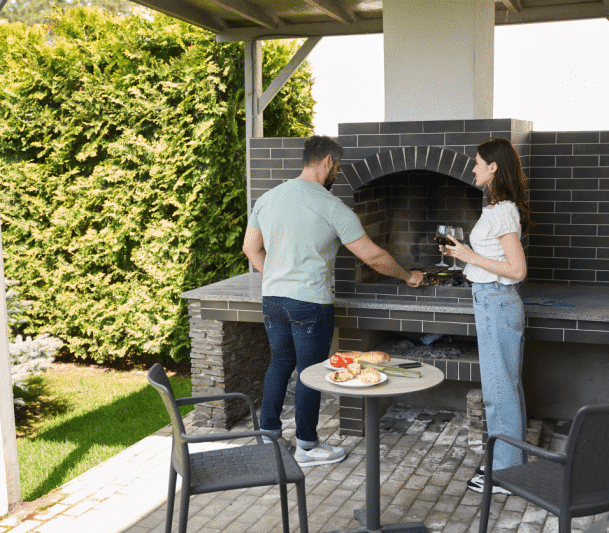 Family enjoying outdoor kitchen