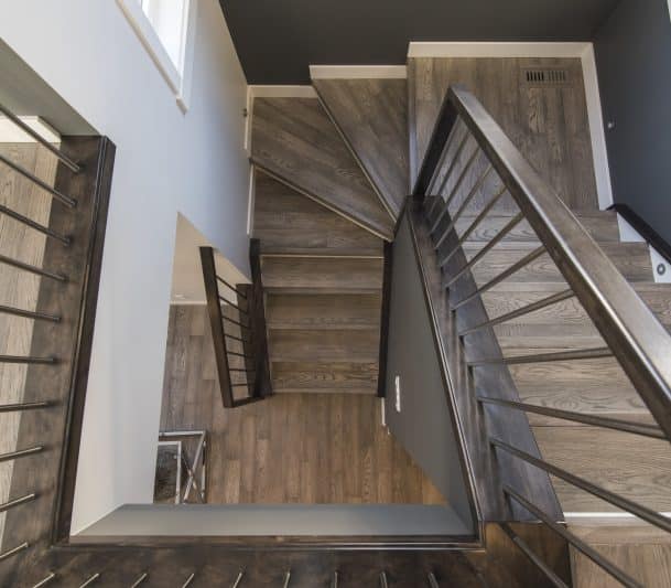 stairs with brown stair railings