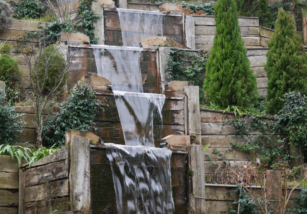 Wood retaining wall with   waterfall